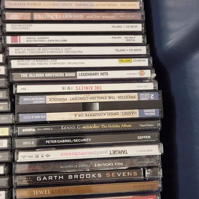 Lot of Music CDs includes tote Jimmy Buffett, Fleetwood Mac, Jimi Hendrix, Eagles, ZZ Top ,Rock Artifacts