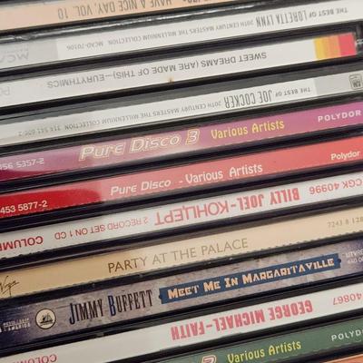 Lot of Music CDs includes tote Jimmy Buffett, Fleetwood Mac, Jimi Hendrix, Eagles, ZZ Top ,Rock Artifacts