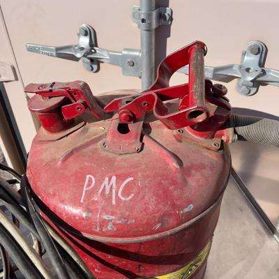 Fuel Can and a Jumper Cable 