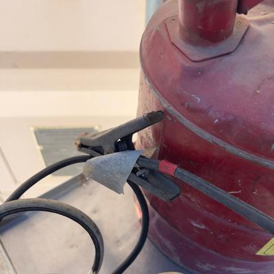 Fuel Can and a Jumper Cable 