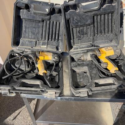 2 DeWalt Impact Drivers1/2" includes hard cases. 