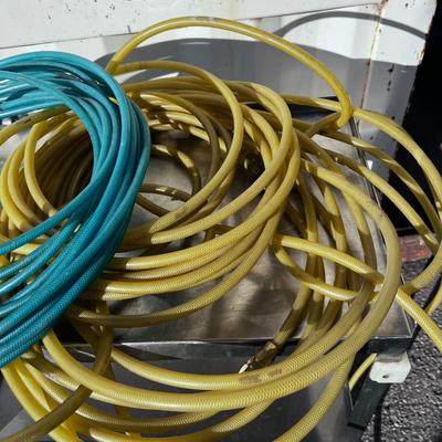 Yellow and Green Air Hose. 