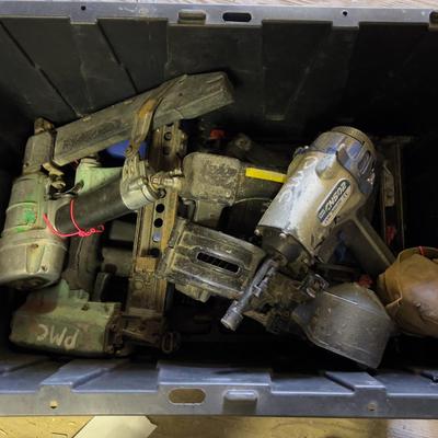 Tub full of Broken Air Nailers 