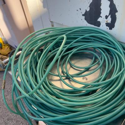 2- 100 Foot Blue Air Hose. 