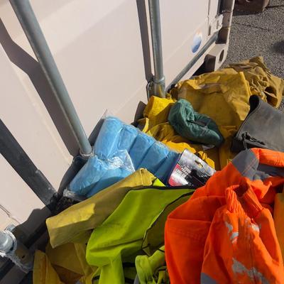 Pile of Rain Coats and Safety Gear