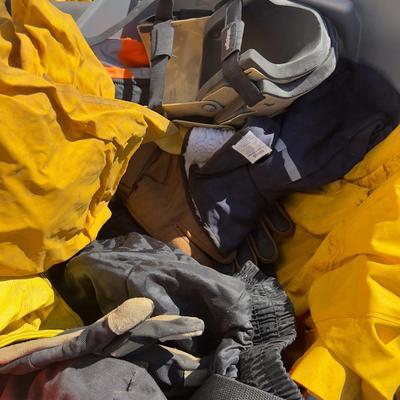 Pile of Rain Coats and Safety Gear
