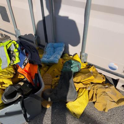 Pile of Rain Coats and Safety Gear