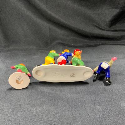 Lot 62 | Crack the Whip Skaters