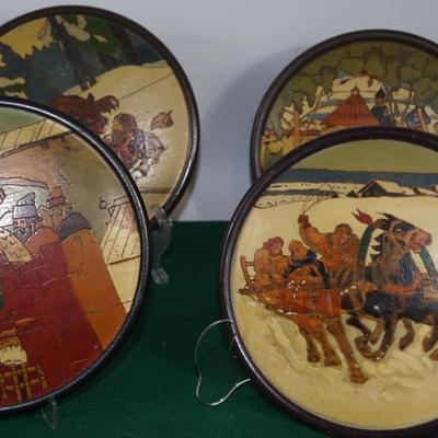 VINTAGE GROUPING OF FOUR ROUND WOOD WALL PLAQUES- SOVIET UNION,