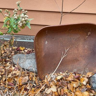 2 vintage wheel barrows