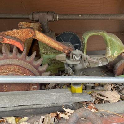 Lawn tractors and rusty metal pieces