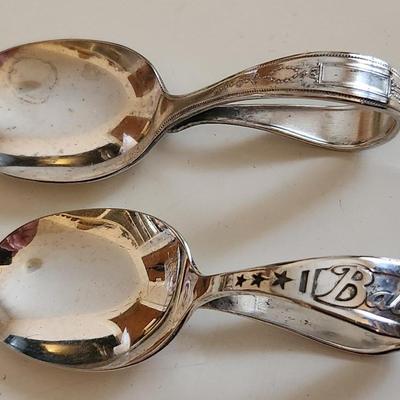 Sale Photo Thumbnail #380: This auction lot is for Two Silverplated Baby Feeding Spoons.  One is quite modern with the word "Baby" and the other has a 20's vibe.  Both are marked - one is Imperial and the other Community.  Great gifting idea for any newborns.