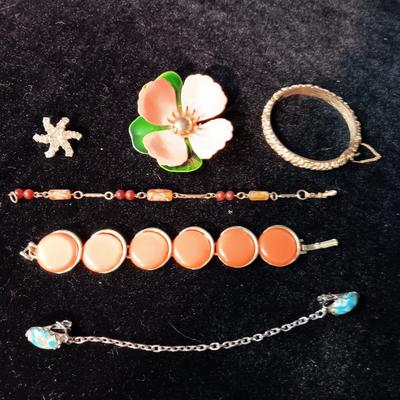 TRIFARI BRACELET, CORAL COLORED BRACELET AND BROOCH, RHINESTONE PIN AND MORE