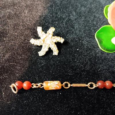 TRIFARI BRACELET, CORAL COLORED BRACELET AND BROOCH, RHINESTONE PIN AND MORE