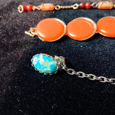 TRIFARI BRACELET, CORAL COLORED BRACELET AND BROOCH, RHINESTONE PIN AND MORE