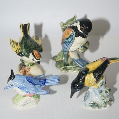 GROUPING OF FOUR CERAMIC AND HAND PAINTED STANGLE BIRDS