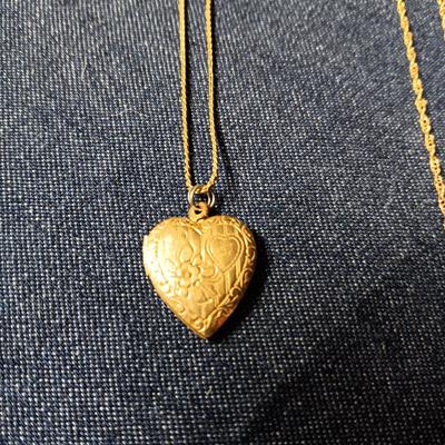 2 GOLD TONE CHAINS AND A HEART LOCKET