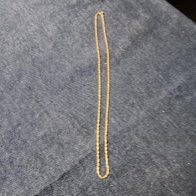 2 GOLD TONE CHAINS AND A HEART LOCKET