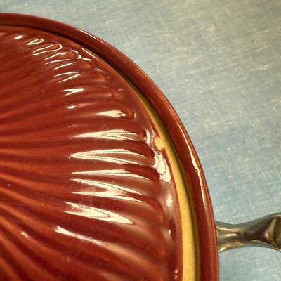 Stoneware casserole with metal stand & lid