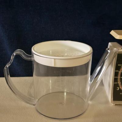 Mixed Kitchen Items - Liquid Shakers, Gravy Seperator, and Kitchen Scale