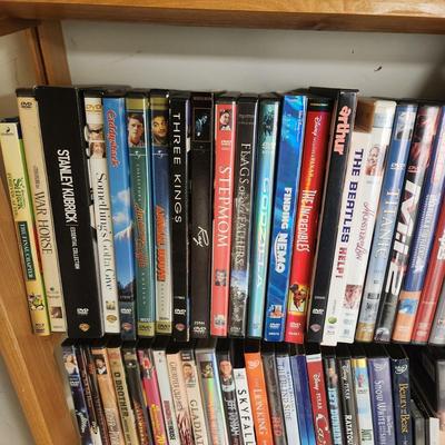 Large Media Lot w rack DVDs CDs Blu-Ray Cassettes Wkrp Star Wars Elvis Disney 007
