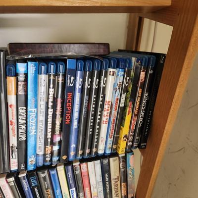 Large Media Lot w rack DVDs CDs Blu-Ray Cassettes Wkrp Star Wars Elvis Disney 007