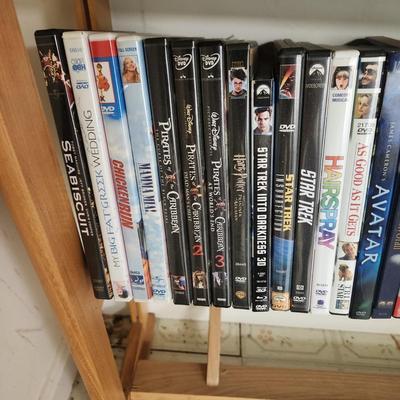 Large Media Lot w rack DVDs CDs Blu-Ray Cassettes Wkrp Star Wars Elvis Disney 007