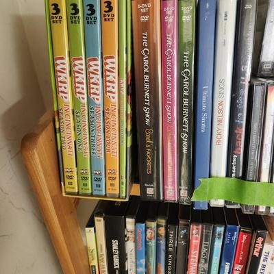 Large Media Lot w rack DVDs CDs Blu-Ray Cassettes Wkrp Star Wars Elvis Disney 007