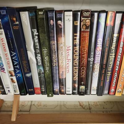 Large Media Lot w rack DVDs CDs Blu-Ray Cassettes Wkrp Star Wars Elvis Disney 007