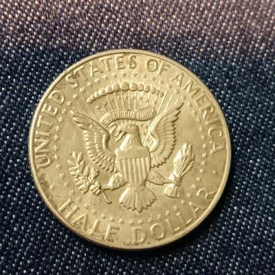 TWO 1964 SILVER KENNEDY HALF DOLLARS