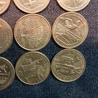 AN ASSORTMENT OF STATE QUARTERS