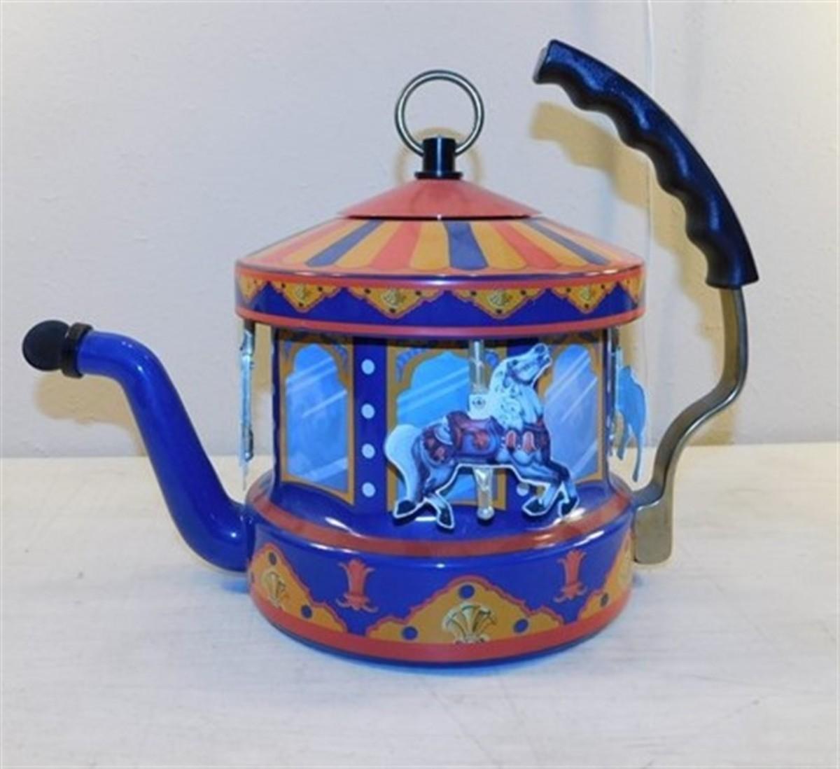 6337 220 MKI Kamenstein World of Motion Tea Kettle Carousel with Spout Cap 15 x 8 x 10.5 EstateSales