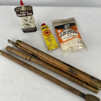Gun oil, patches, grease and cleaning rod