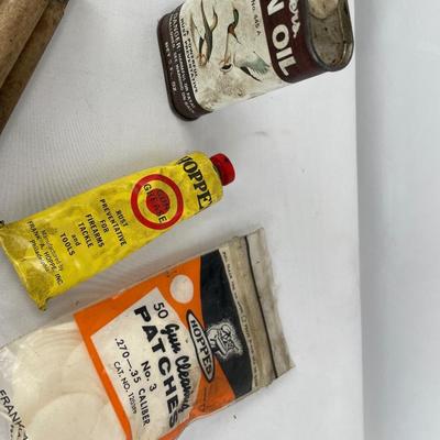Gun oil, patches, grease and cleaning rod