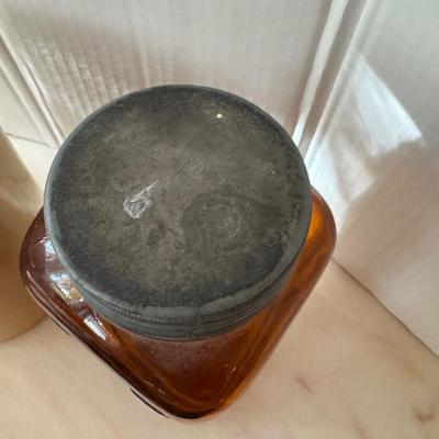 Jar has P marked on bottom with original top from Chemist in Philadelphia. Measuring 9” high x