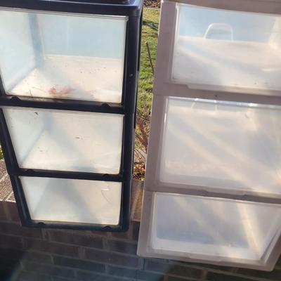Set of two plastic drawer sets.