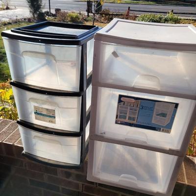 Set of two plastic drawer sets.
