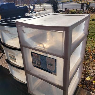 Set of two plastic drawer sets.