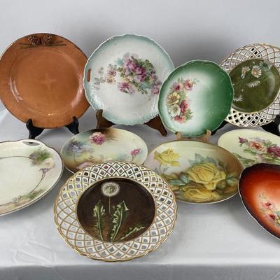 Large collection of porcelain decorative plates