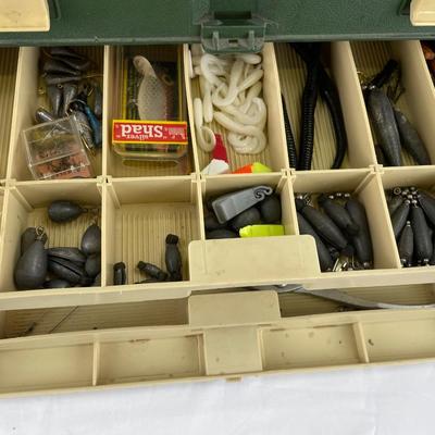 Very full fishing tackle box