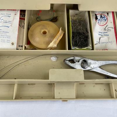 Very full fishing tackle box