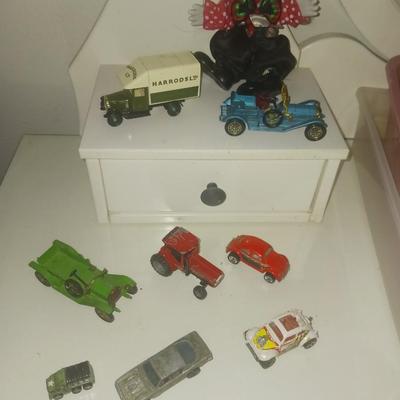 METAL TOY CARS AND A CLOWN