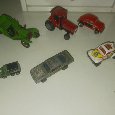 METAL TOY CARS AND A CLOWN