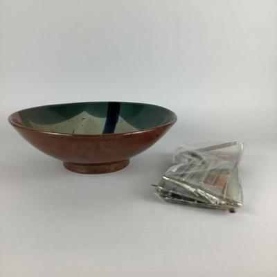 Sale Photo Thumbnail #1009: Center piece bowl is brown, maroon, grey and black in color, measures: 13" diameter x 4" high