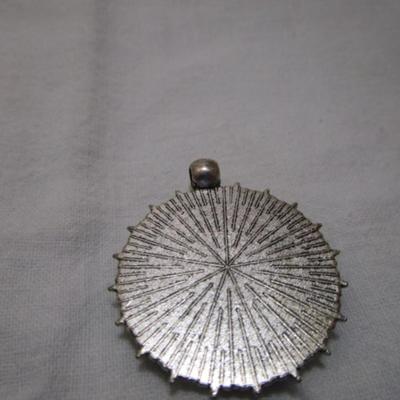 1 ring with eagle on it size 12, 2 pendants (one has an eagle with rebel flag, one is a cross with wings