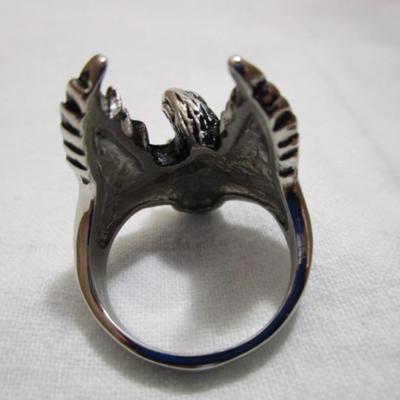 1 ring with eagle on it size 12, 2 pendants (one has an eagle with rebel flag, one is a cross with wings