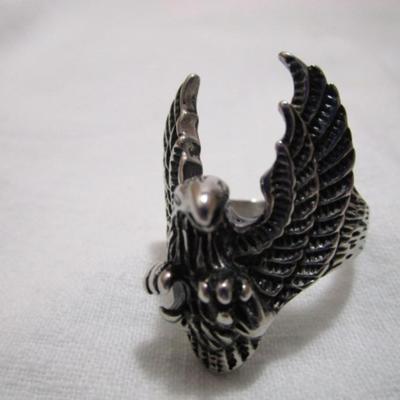 1 ring with eagle on it size 12, 2 pendants (one has an eagle with rebel flag, one is a cross with wings
