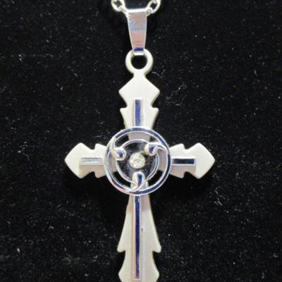 Cross (2" x 1-1/4) with a clear stone in the middle and with 19" chain
