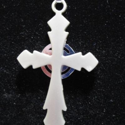 Cross (2" x 1-1/4) with a clear stone in the middle and with 19" chain
