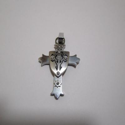 2 crosses  (one is 1-3/4" x 1-1/4" Black & Blue brand;  one is 1-1/2" x 1") both with tiny stone, no chains
